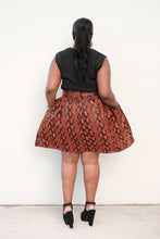 orange and black dark skirt